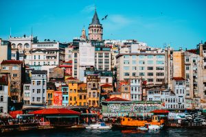 Vibrant view of Istanbul's Galata district with historic architecture and city life.